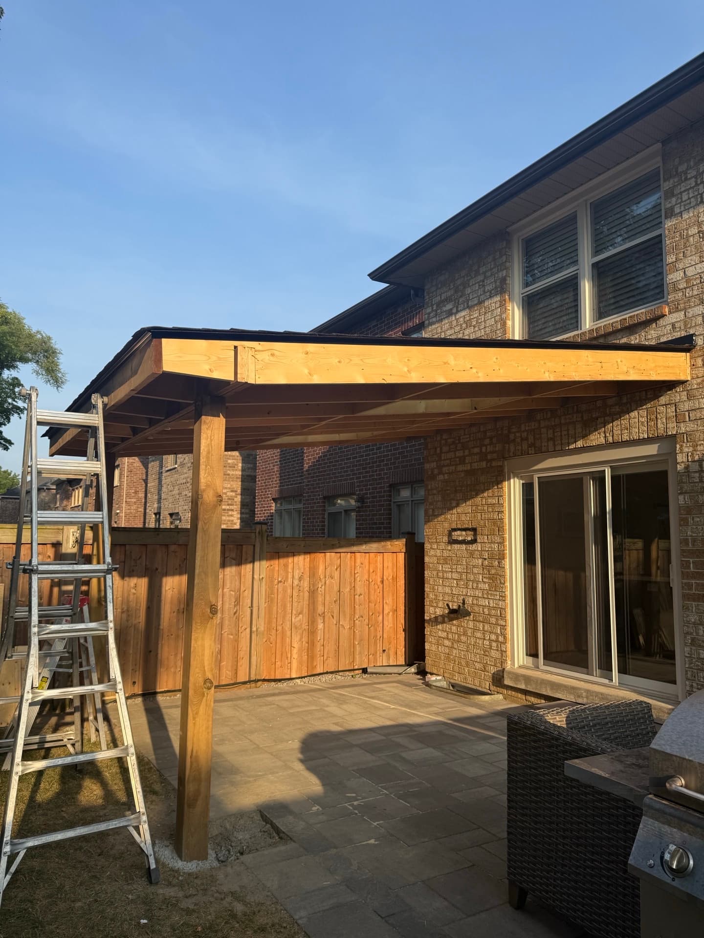 Spring property cleanup in Scarborough — mulching and pruning