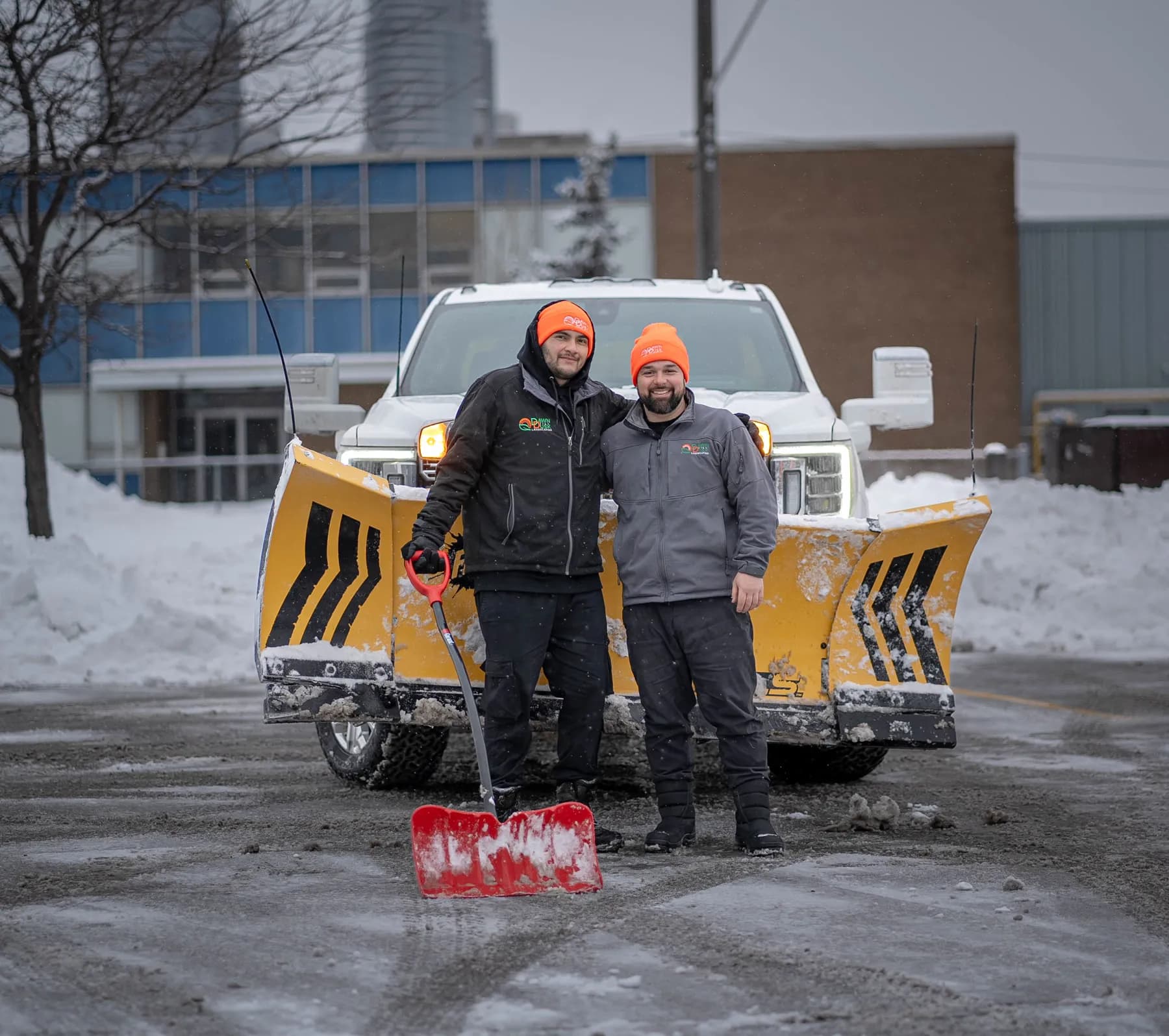 Dawn Till Dusk crew with the Fisher plow blade and shovel after a storm